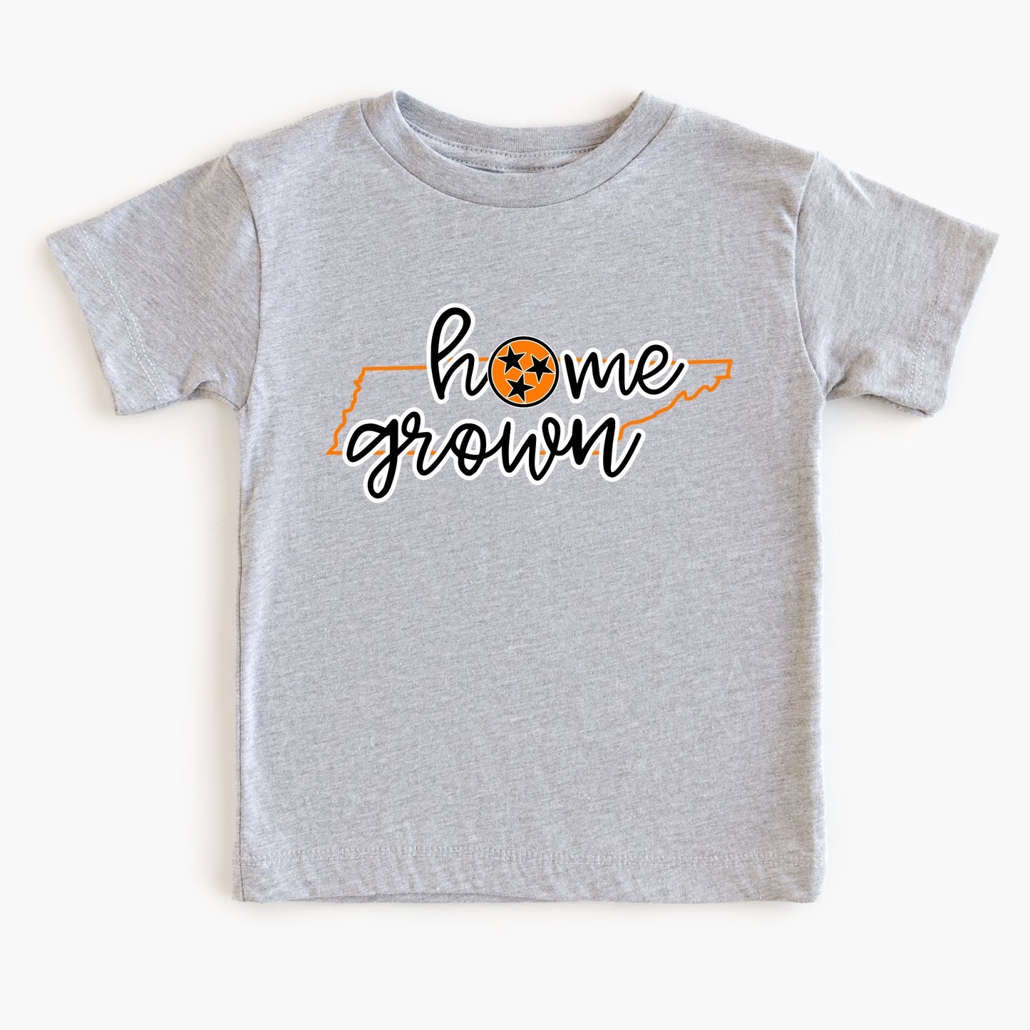 Gray t-shirt with 'home grown' text and a logo on a white background