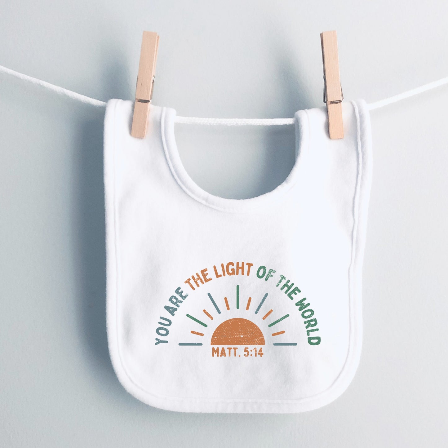 Light of the World- Cotton infant bib
