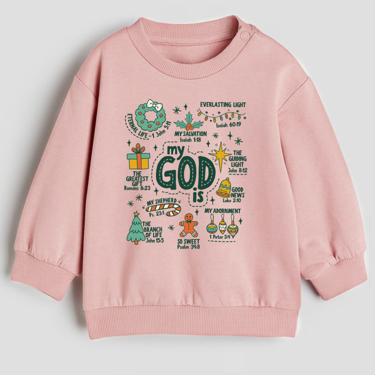 Pink children's sweatshirt with colorful text and graphics on a light gray background