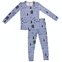 Children's ski pajama set with a blue pattern on a white background. Apres ski, chair lifts, snowboards, skis, powder days