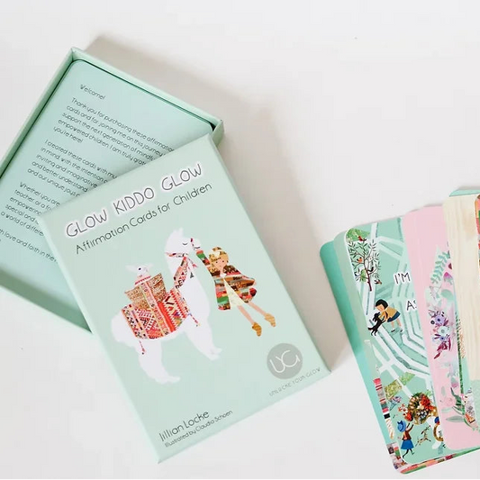 Glow Kiddy Glow affirmation cards for children on a white surface