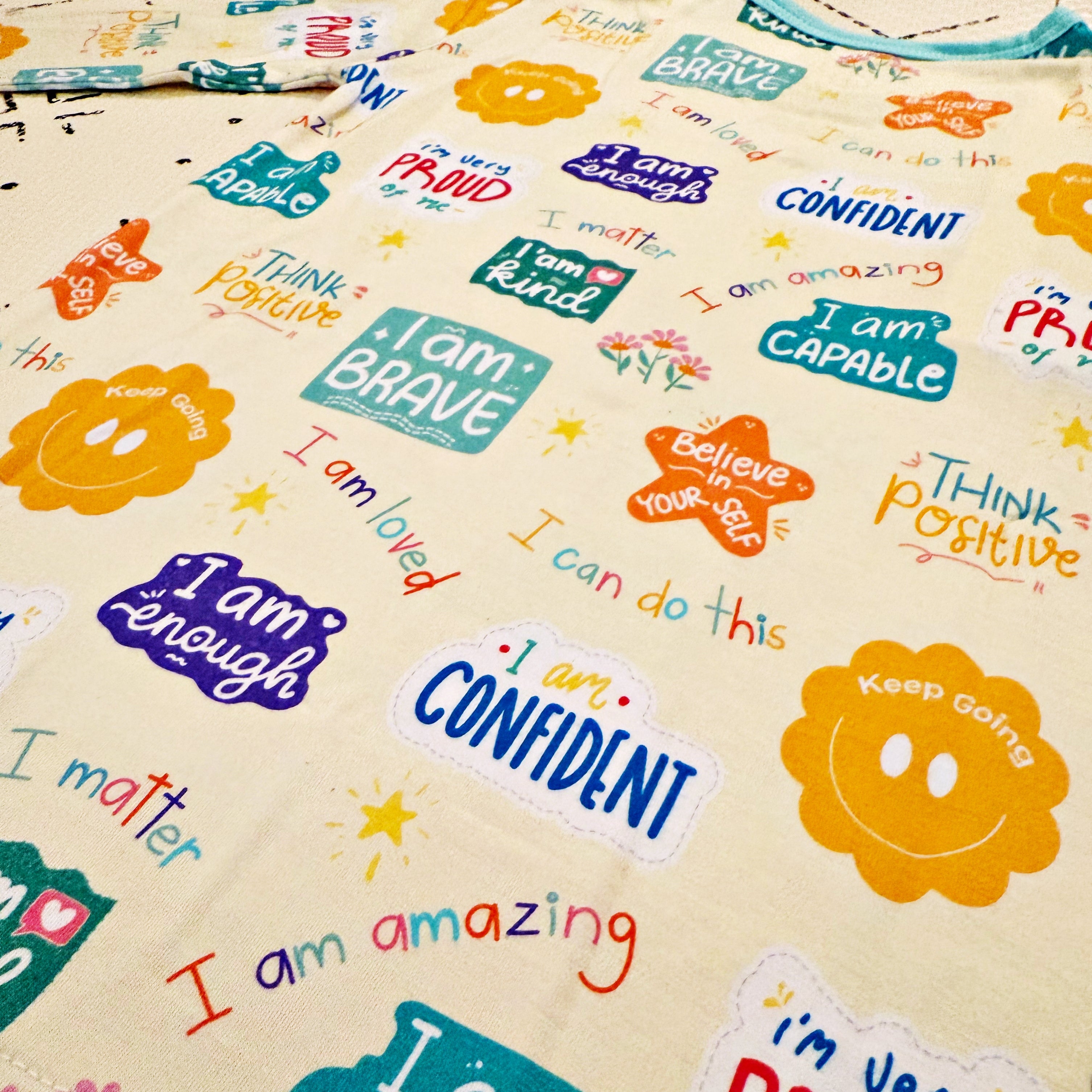 positive affirmation messages on a childrens bamboo pajama set