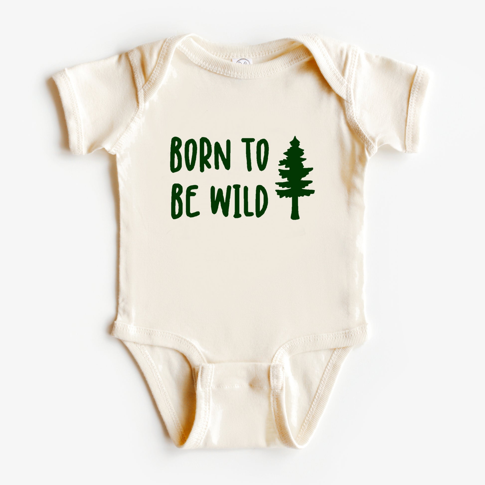 Baby onesie with 'Born to Be Wild' text and tree graphic on a white background