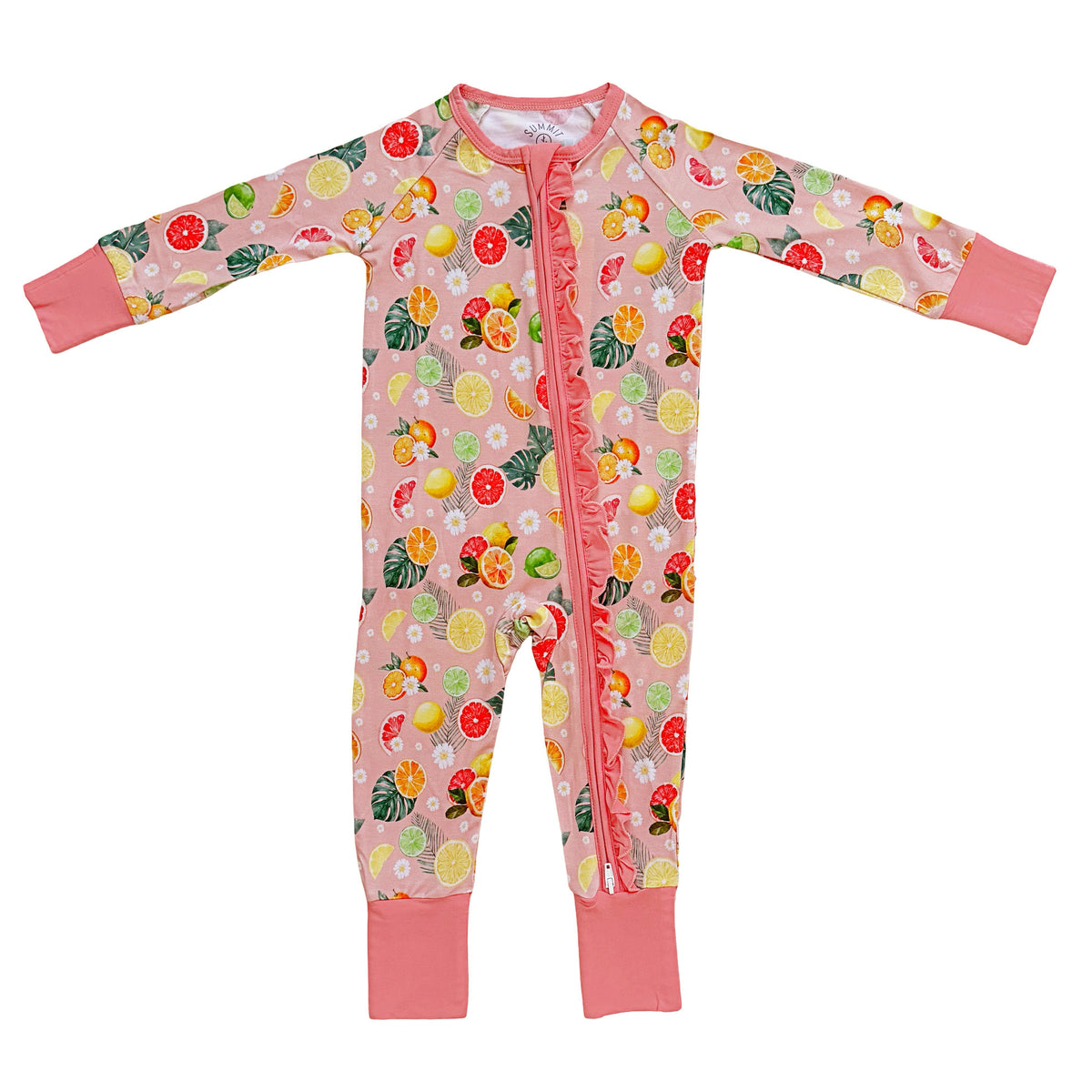 A baby long-sleeve footless one-piece sleeper in light pink, featuring a colorful fruit and flower print, a ruffled front zipper, and solid pink cuffs and foot cuffs, shown flat on a white background.