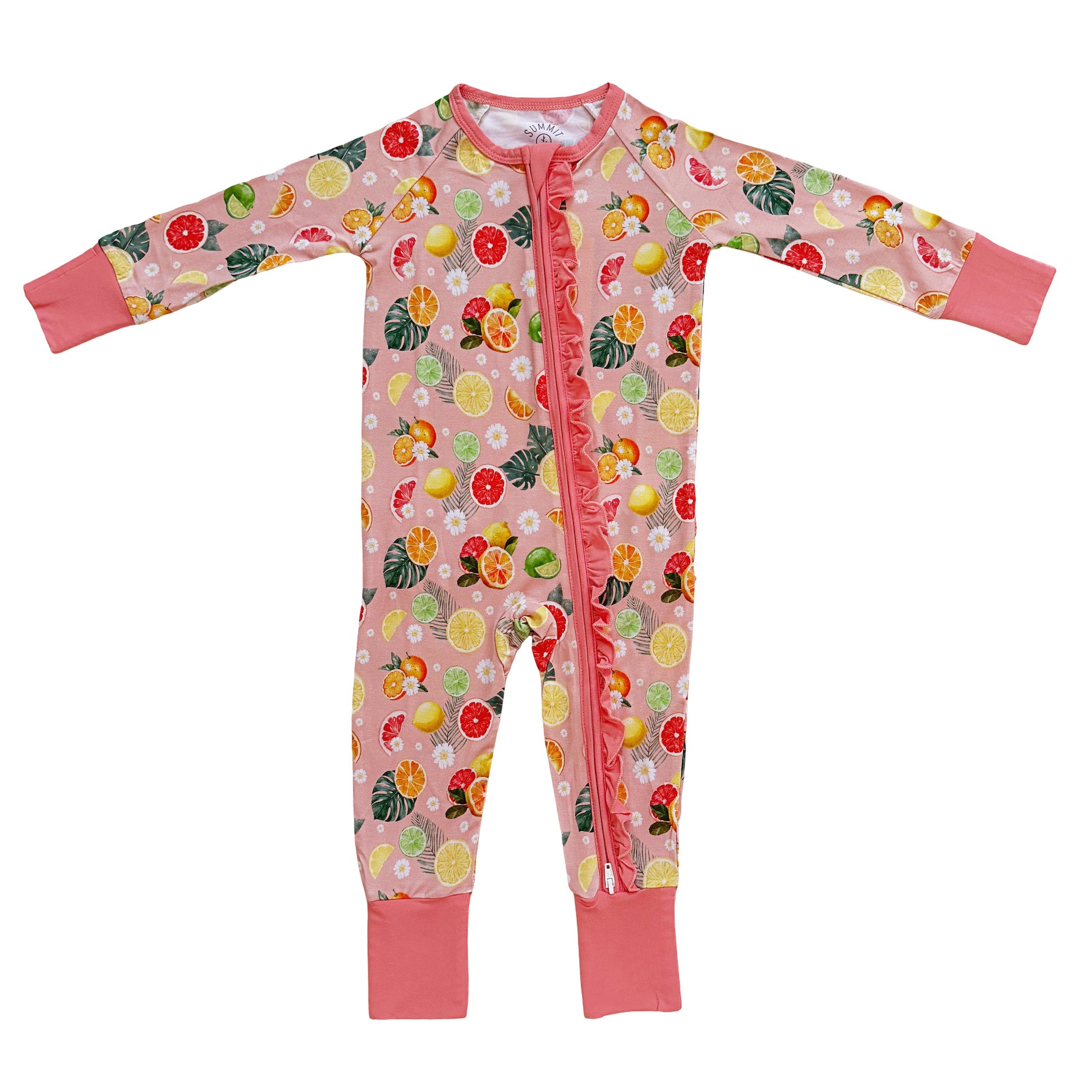Baby onesie with fruit pattern on a white background