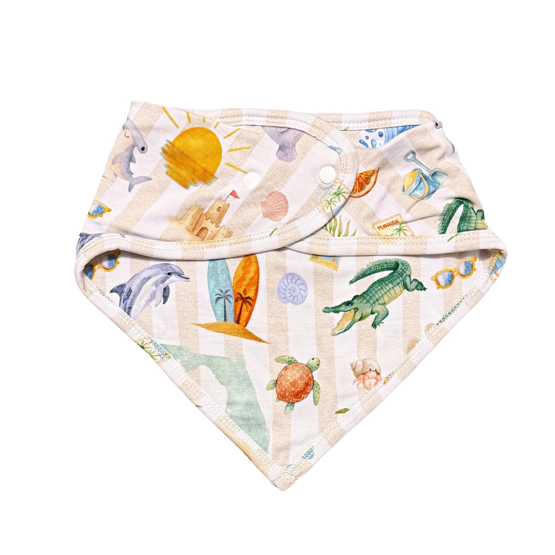 Baby bandana bib with ocean-themed print on a white background