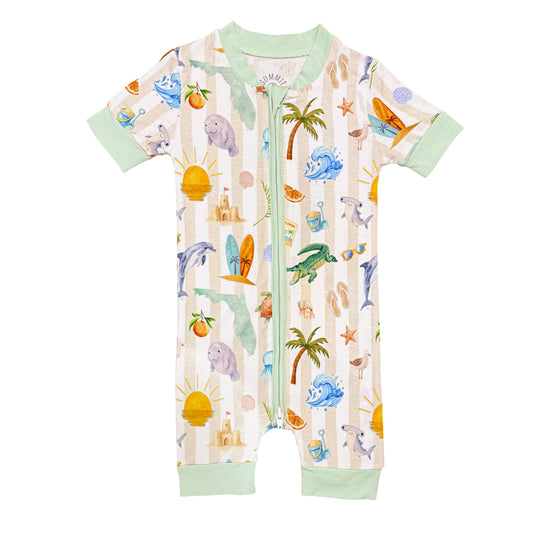 Baby romper with animal and beach pattern on a white background