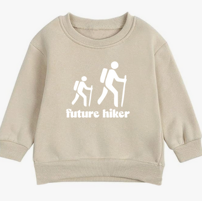Beige sweatshirt with 'future hiker' design on a white background