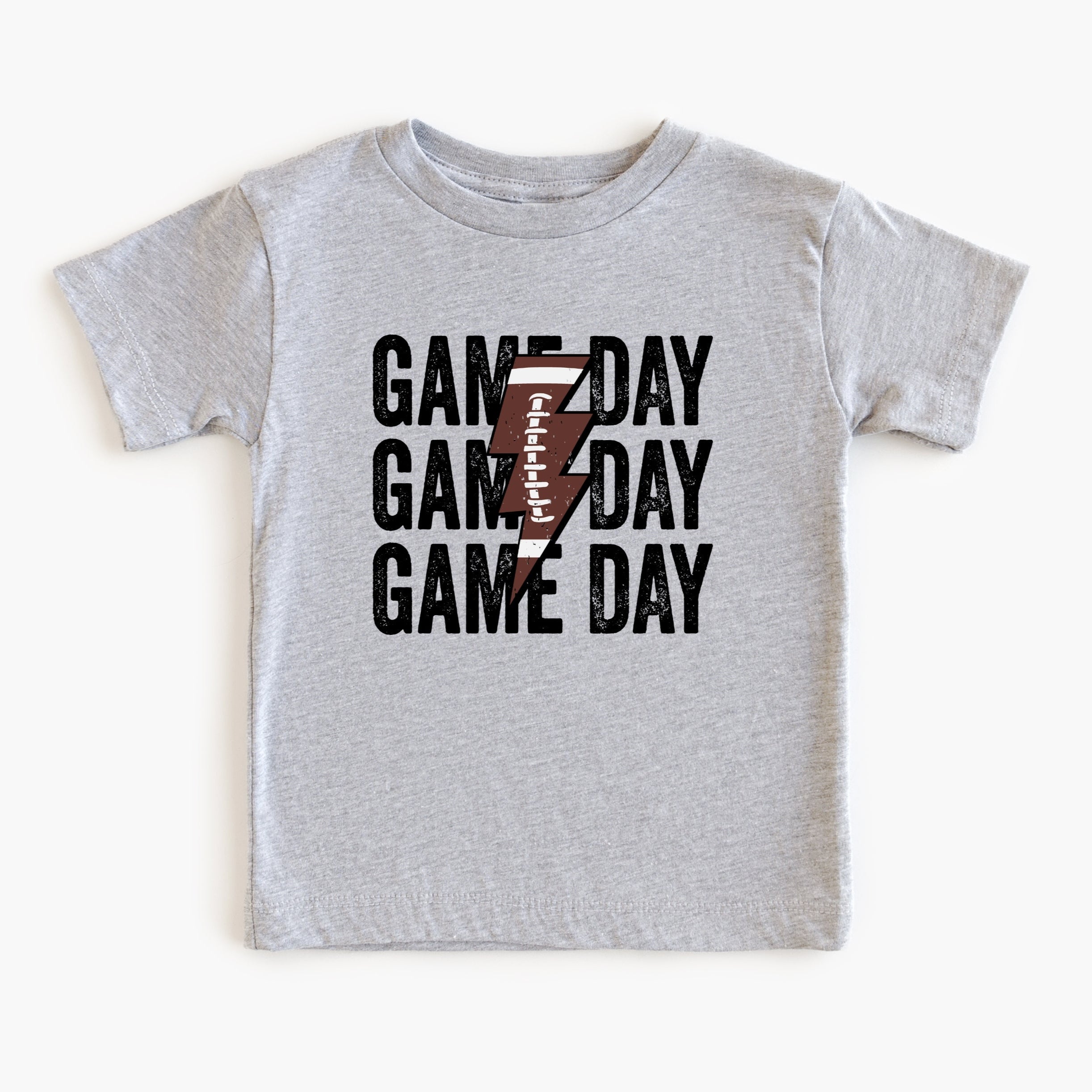 Gray t-shirt with 'Game Day' text and football graphic on a white background