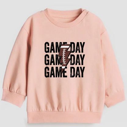 Pink sweatshirt with 'GAMEDAY' text and number 7 on a light gray background