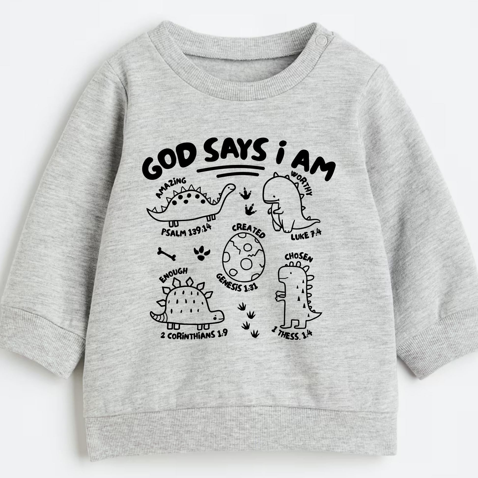 Gray sweatshirt with black dinosaur illustrations and faith based text on a white background