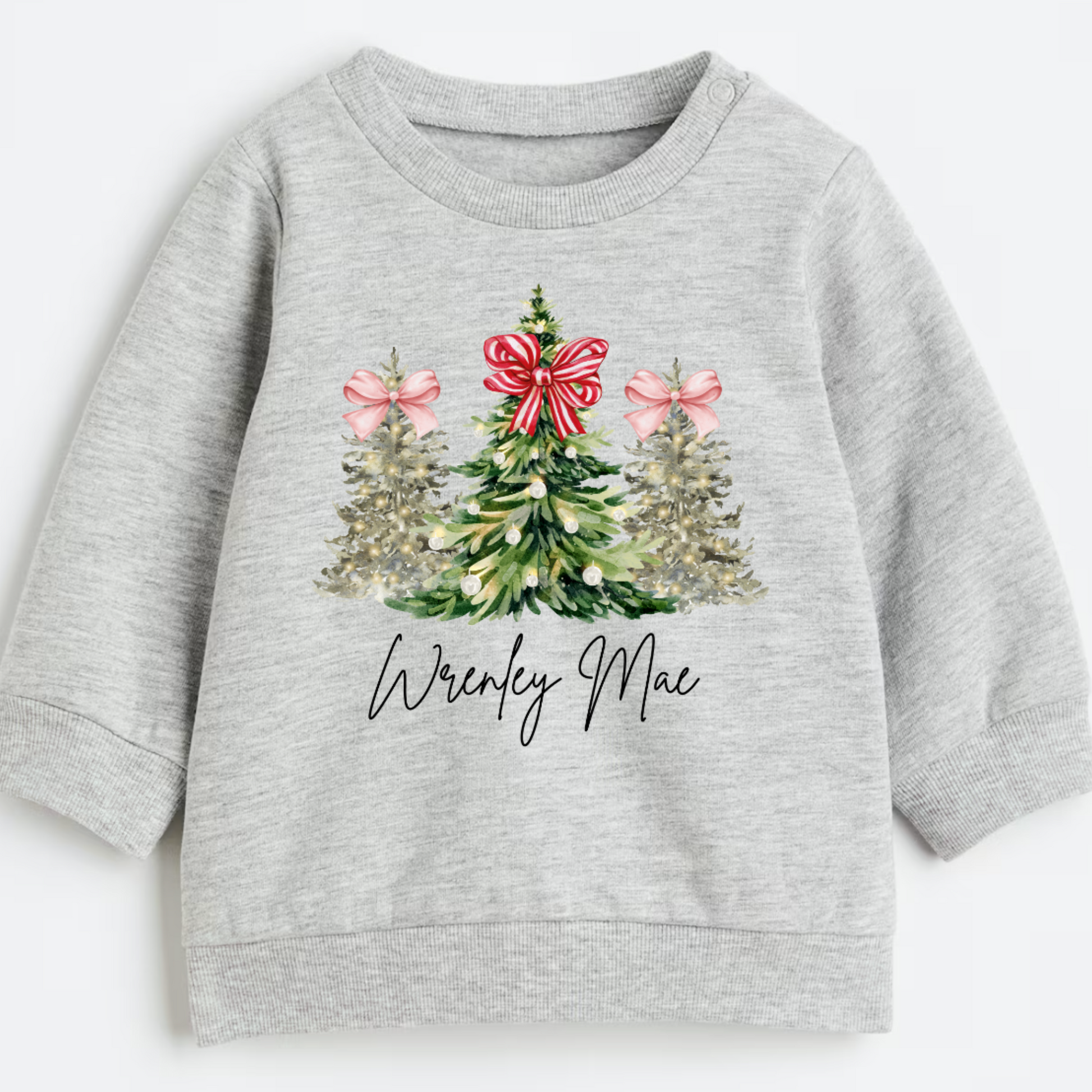 Gray sweatshirt with Christmas tree design and 'Wrenley Mae' text on a white background