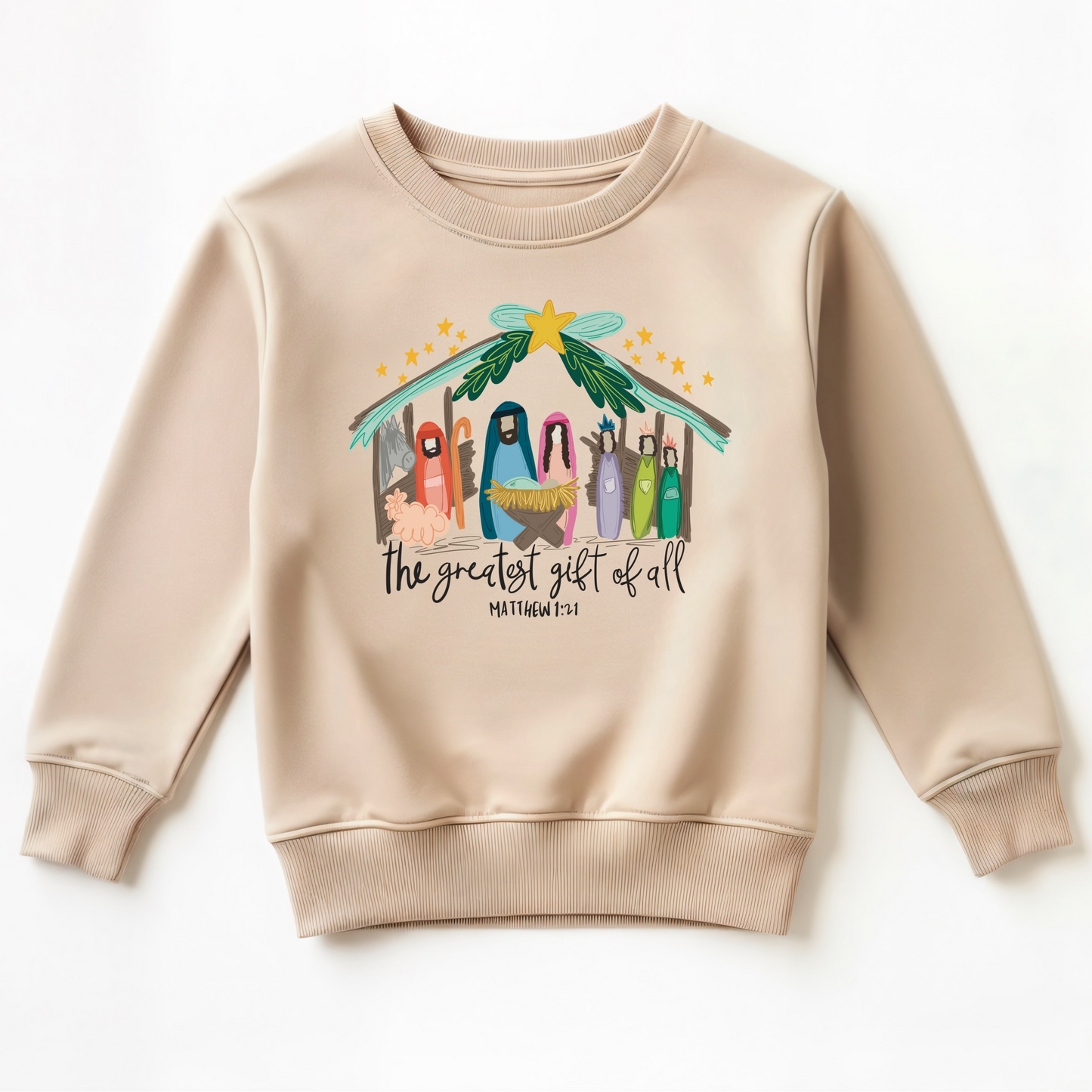 Beige sweatshirt with nativity scene design and text on a white background