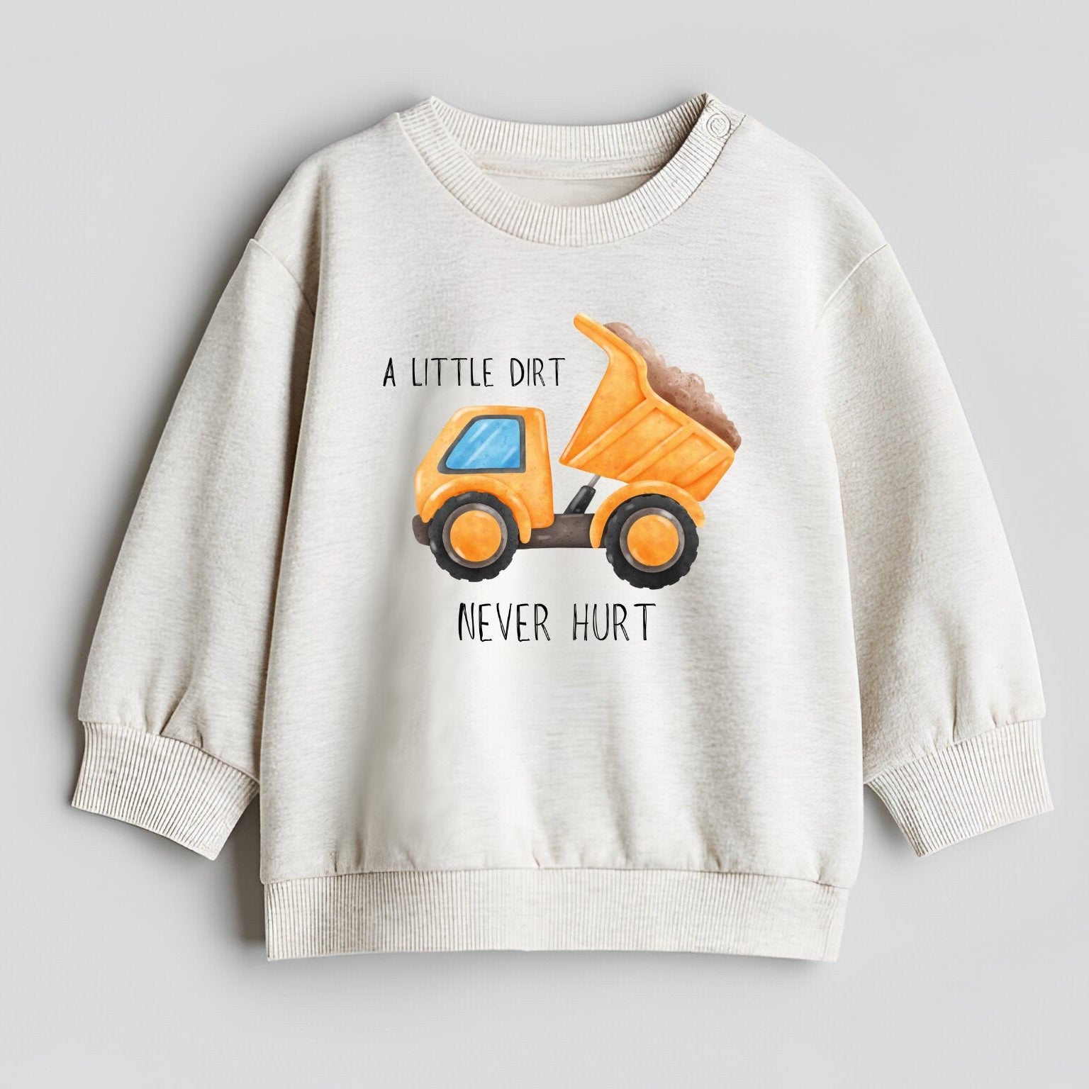 Children's sweatshirt with a dump truck graphic and text on a light gray background