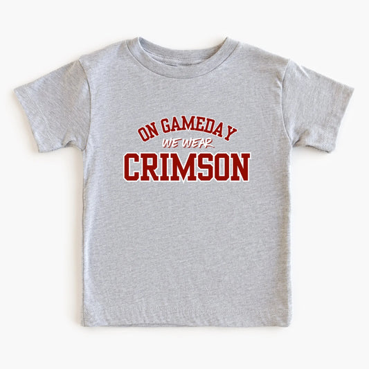 Gray t-shirt with 'On Gameday We Wear Crimson' text on a white background