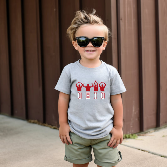 boy in gray ohio shirt. referee signal and words ohio. ohio state