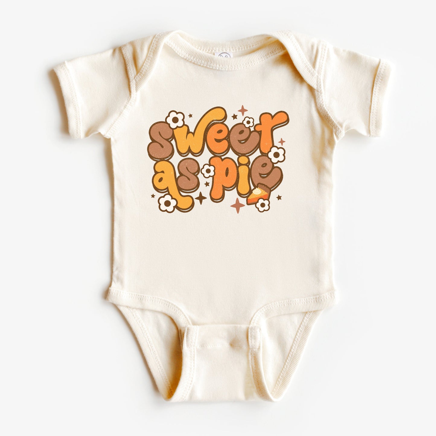 Baby onesie with 'Sweet as Pie' text on a white background