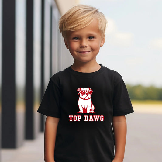 Child wearing a black t-shirt with a bulldog graphic and 'TOP DAWG' text.