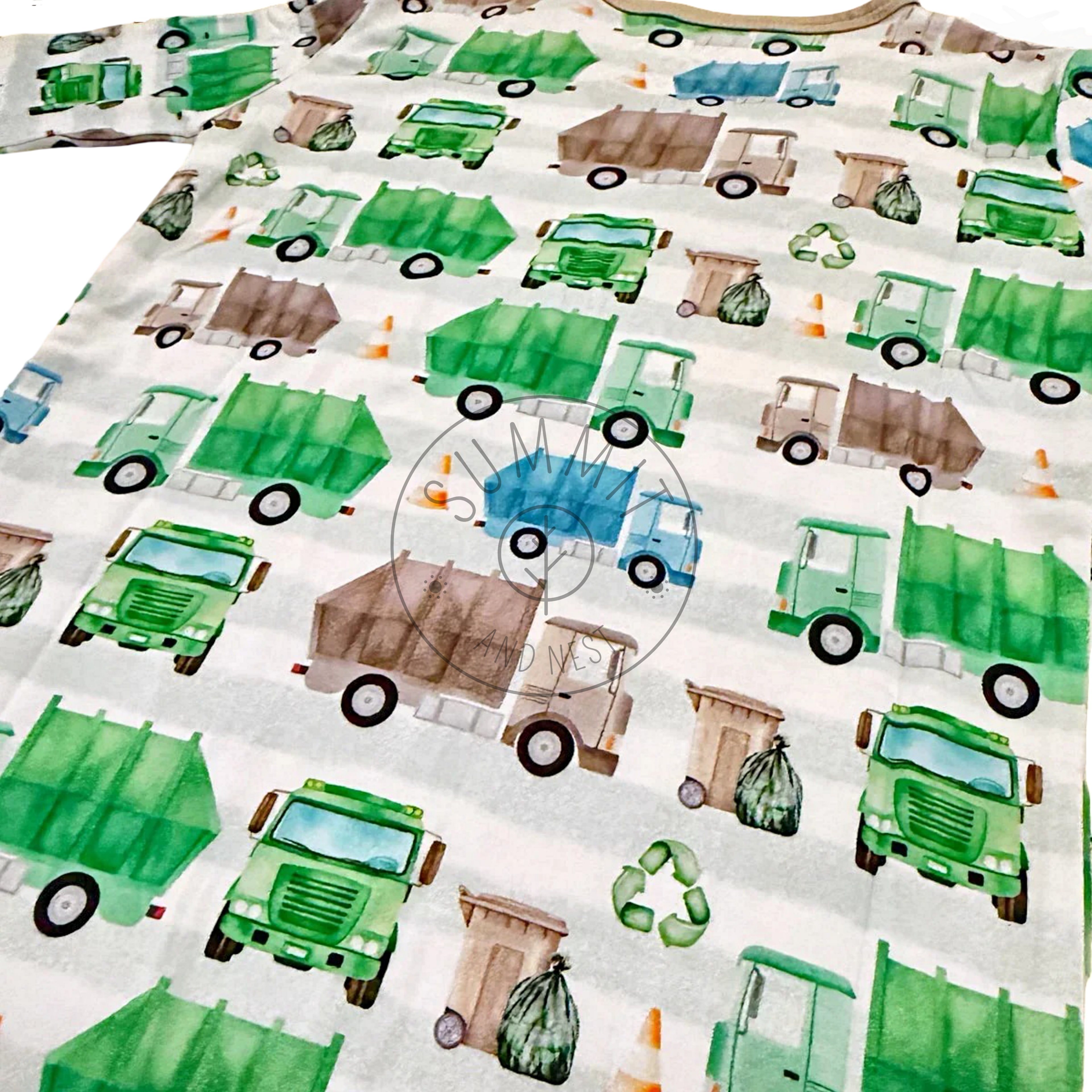 Bamboo pajama Fabric with green and brown garbage trucks and recycling symbols on a white background