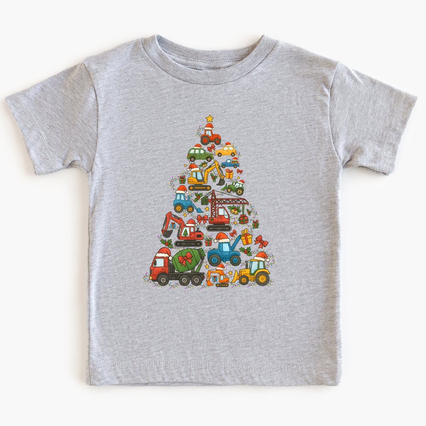 Gray t-shirt with a colorful Christmas tree design of construction vehicles on a white background